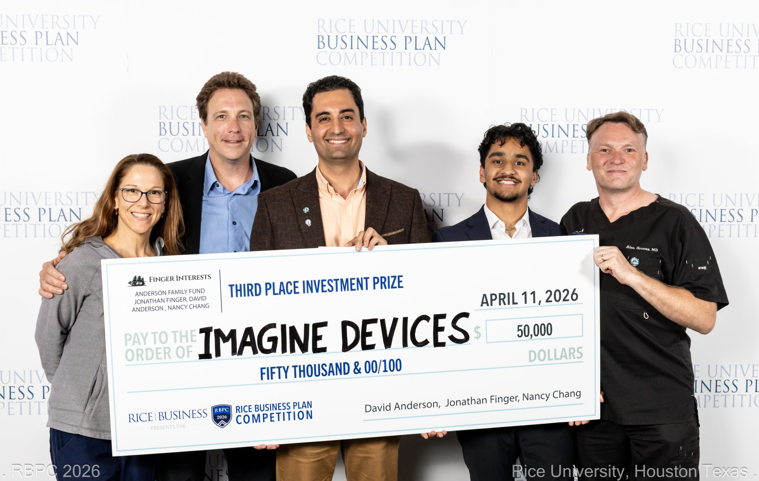 Imagine Devices team receiving the Rice Business Plan Competition award at the 2026 banquet